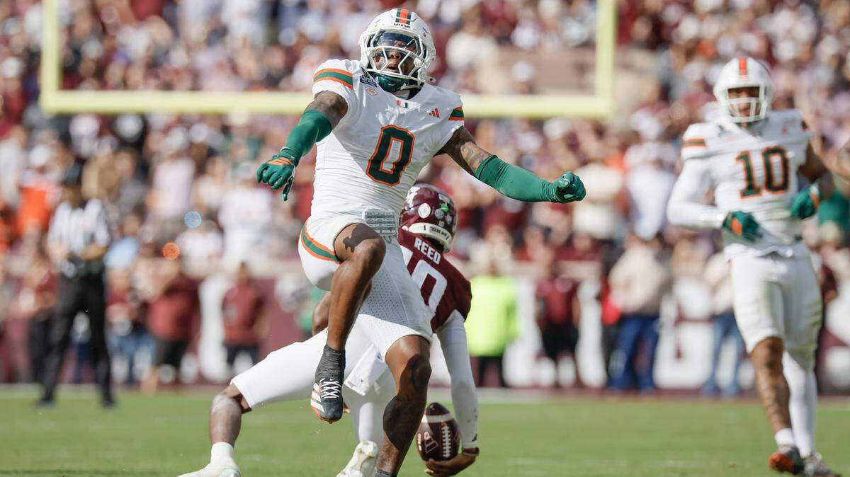 Miami Hurricanes defensive back Keionte Scott (0) reacts after sacking Texas A&M Aggies quarterback Marcel Reed (10) in the second half of the first round of the 2025 College Football Playoff at Kyle Field at College Station, Texas, on Saturday, December 20, 2025.