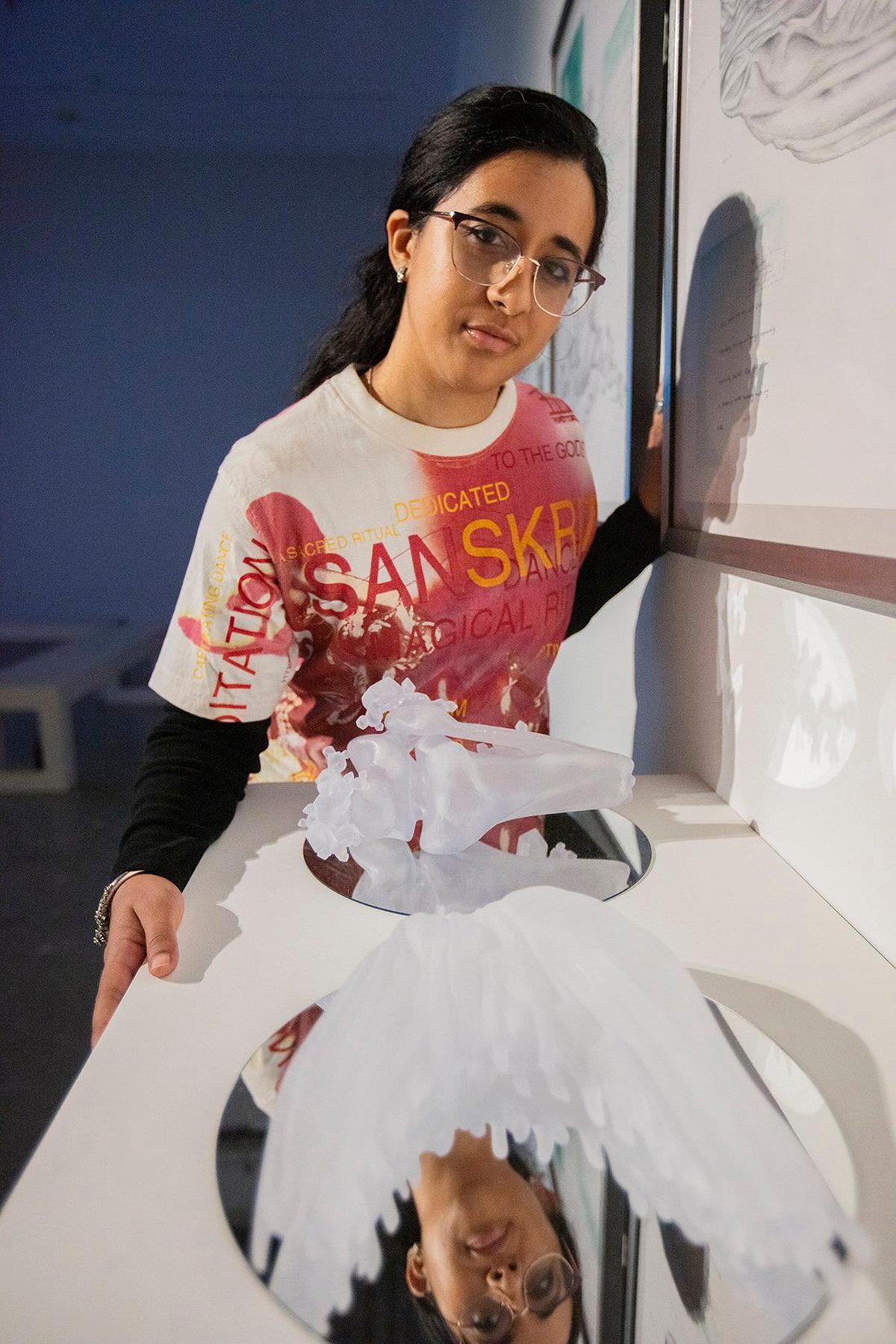 Artist Smita Sen with her artwork titled “Sculptures Crystalline Injury; Breathing Sideways; Internal Bleeding; Hold, Carry, Solidify” at MOCA in North Miami on Friday, Dec. 6, 2024.