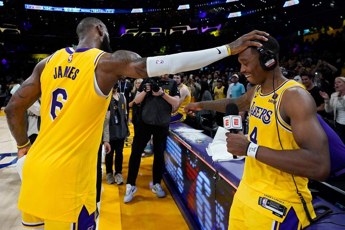 Los Angeles Lakers’ LeBron James, left, congratulates Lonnie Walker IV after the Lakers defeated the Golden State Warriors 104-101 in Game 4 of an NBA basketball Western Conference semifinal Monday, May 8, 2023, in Los Angeles. (AP Photo/Marcio Jose Sanchez)