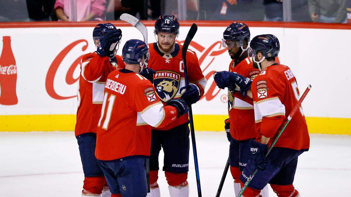 Florida Panthers center Aleksander Barkov (16) is congratulated by teammates after scoring a goal against the Edmonton Oilers during the third period of an NHL game at the FLA Live Arena on Saturday, February 26, 2022 in Sunrise, Fl.