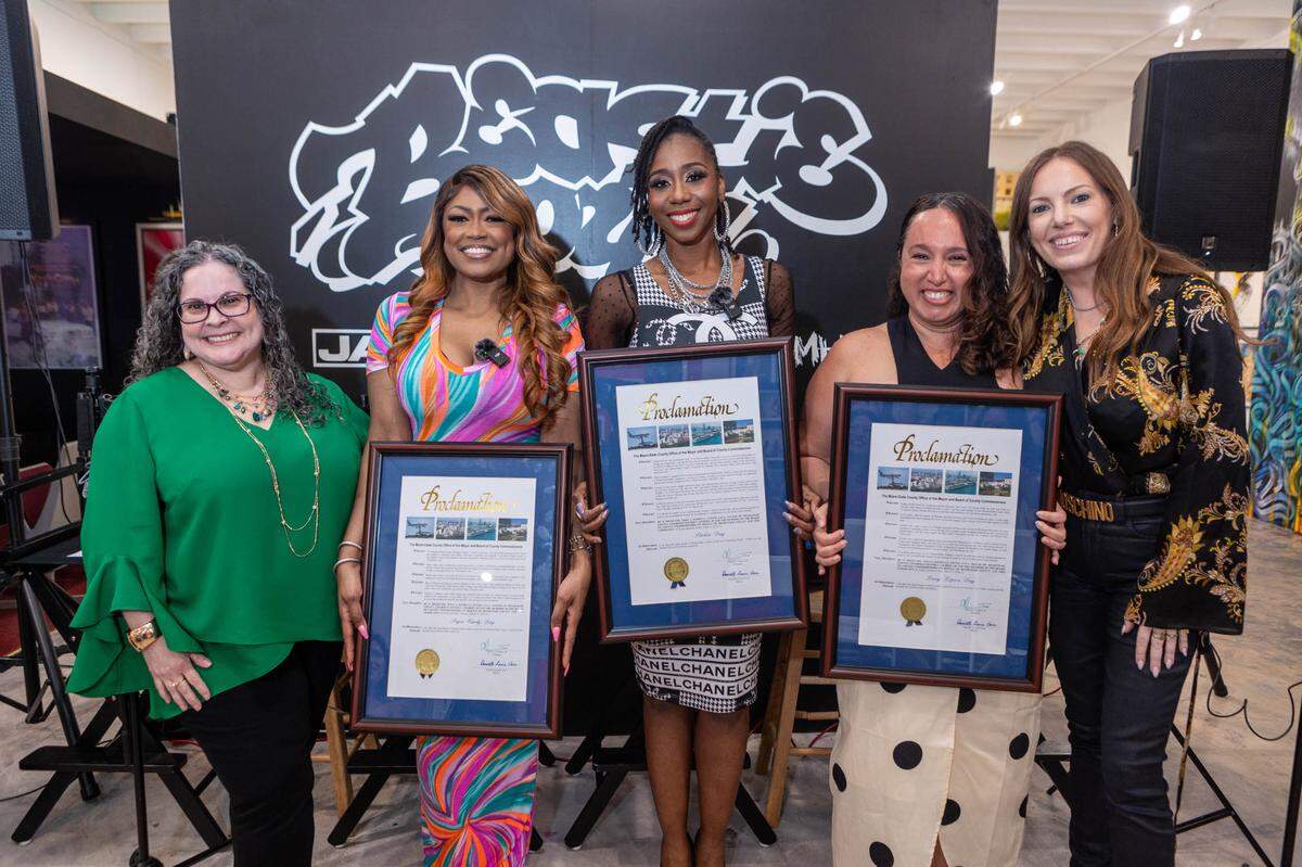 (From left to right) Miami-Dade County Department of Cultural Affairs director Marialaura Leslie, Supa Cindy, Stichiz, Lucy Lopez and Allison Freidin at The Art of Hip Hop on March 15. Supa Cindy, Stichiz and Lucy Lopez were presented with proclamations from Miami-Dade County in honor of their work as local radio hosts.