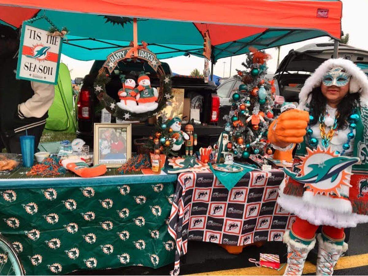 Getting into the holiday spirit in the tailgating area at Hard Rock Stadium before the Miami Dolphins game against the Green Bay Packers on Christmas Day.