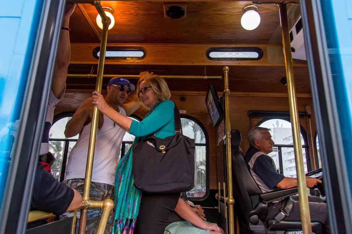 Miami-Dade County Commission candidate Eileen Higgins takes a bus to her home in Downtown Miami after a forum at the Miami Beach Women's Club on Tuesday, May 8, 2018.