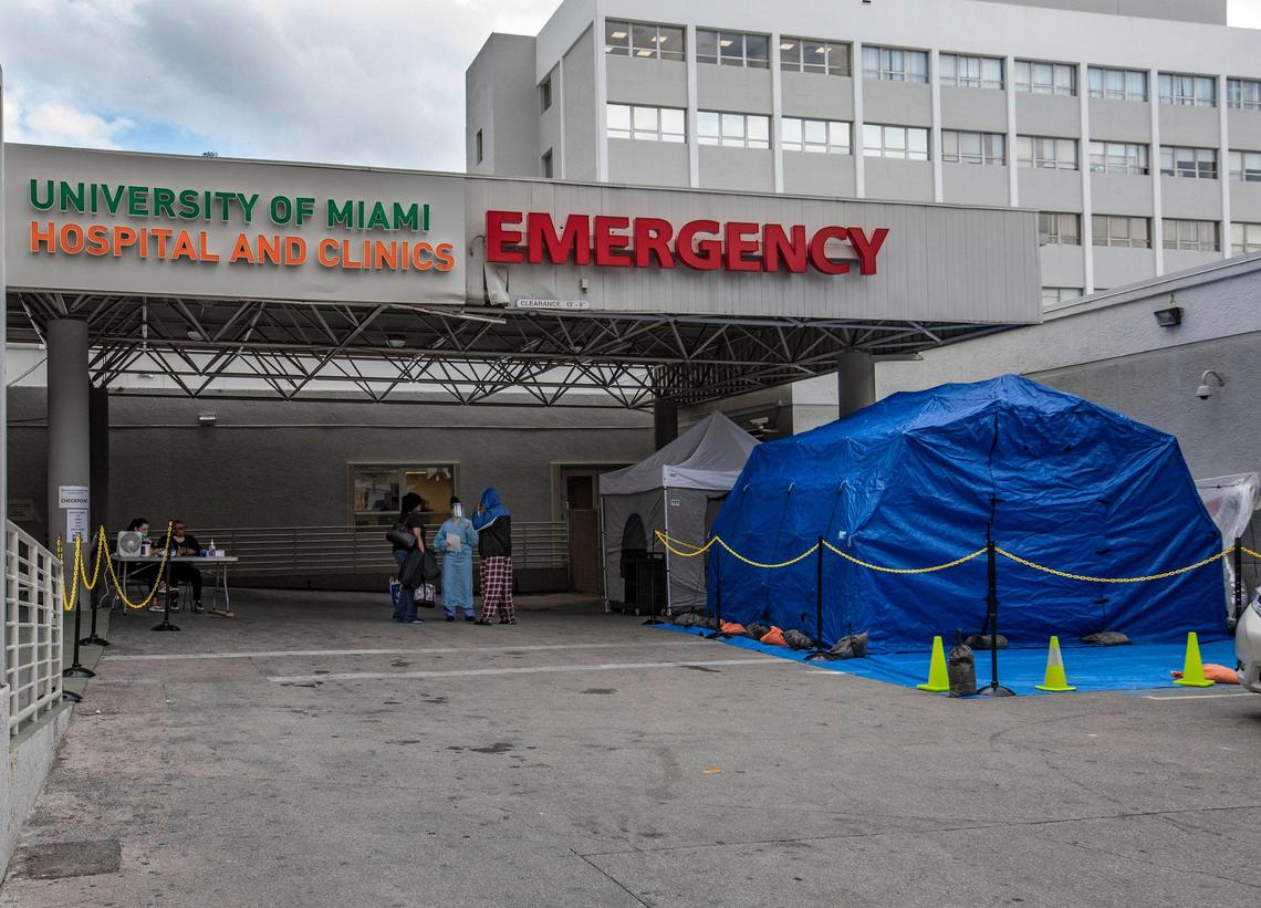 A blue tent is seen outside the emergency entrance to the University of Miami Hospital on Tuesday, March 10, 2020. The negative pressure tent is part of the hospital’s preparations for screening suspected COVID-19 cases.