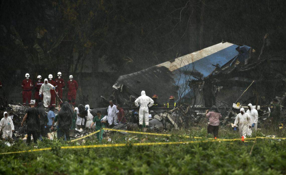 Rescue teams search through the wreckage site of a Boeing 737 that plummeted into a cassava field with 113 people on board, in Havana, Cuba, on May 18, 2018. The Cuban airliner crashed just after takeoff from Havana’s international airport.