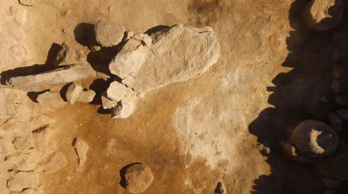 Close up showing some of the white, dusty flour scattered at the ruins.