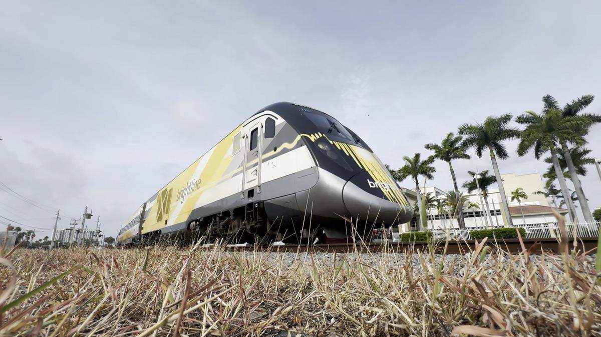 A Brightline train runs through North Miami on Friday, June 27, 2025.