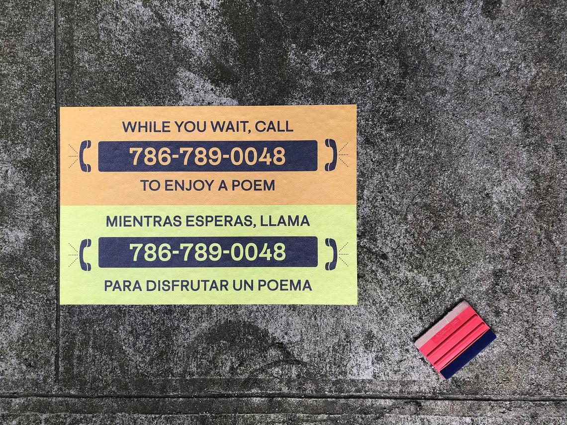 Sidewalk stickers along Sunset Drive encourage listeners to dial a poem as part of the “Poetic Drive” project.