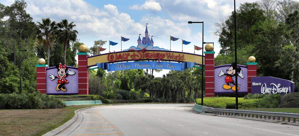 In this file photo, an empty entrance on Western Way as Walt Disney World enters its second week of being shut down in response to the coronavirus pandemic, photographed on March 24, 2020.