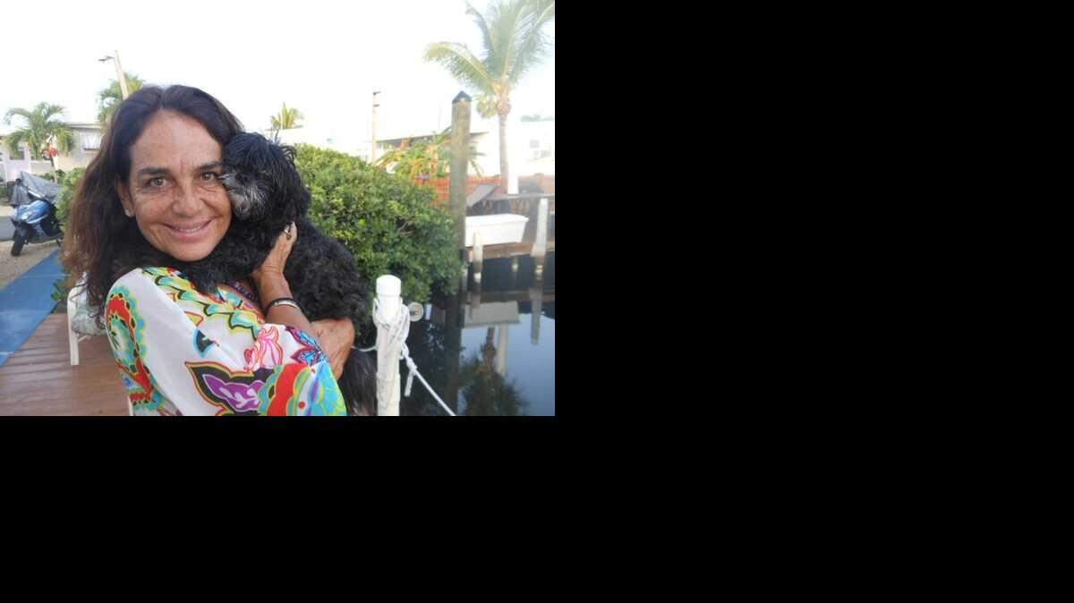 Rosmary Maseri was reunited with her 10-year-old dog Negrita Nov. 17 after she went missing nearly four years ago in Miami.