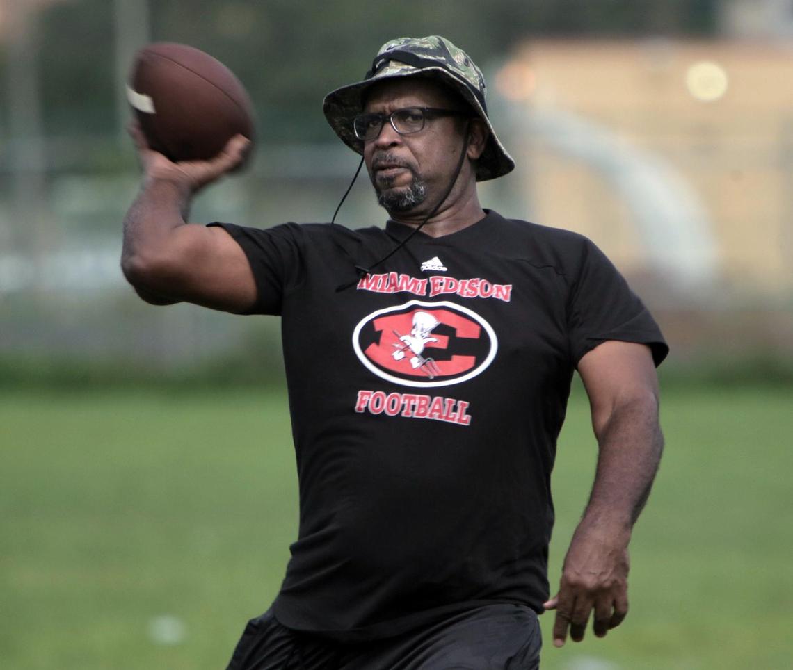 Luther Campbell, the rapper who financed the start-up of the Liberty City Warriors football program and also coaches high school football, tosses a pass during Edison High School team practice.