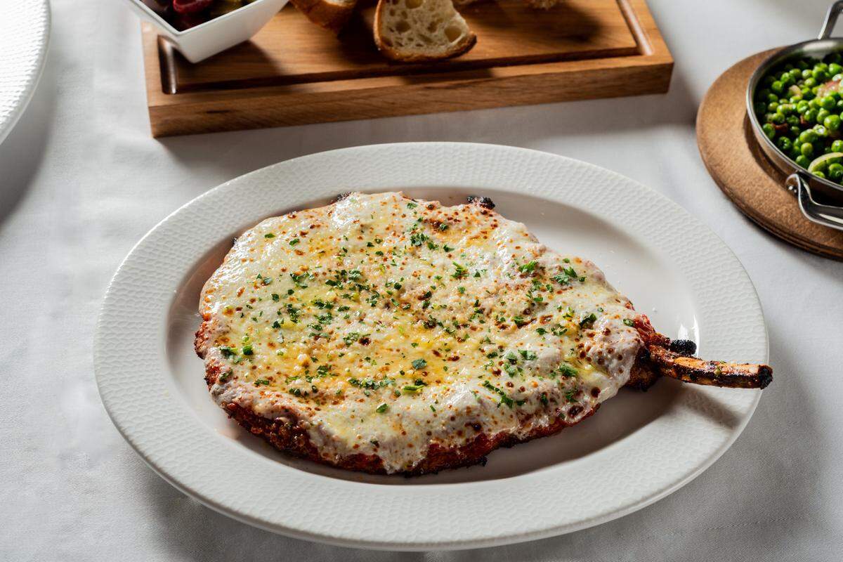 Veal chop parmesan at Rao’s Miami Beach.