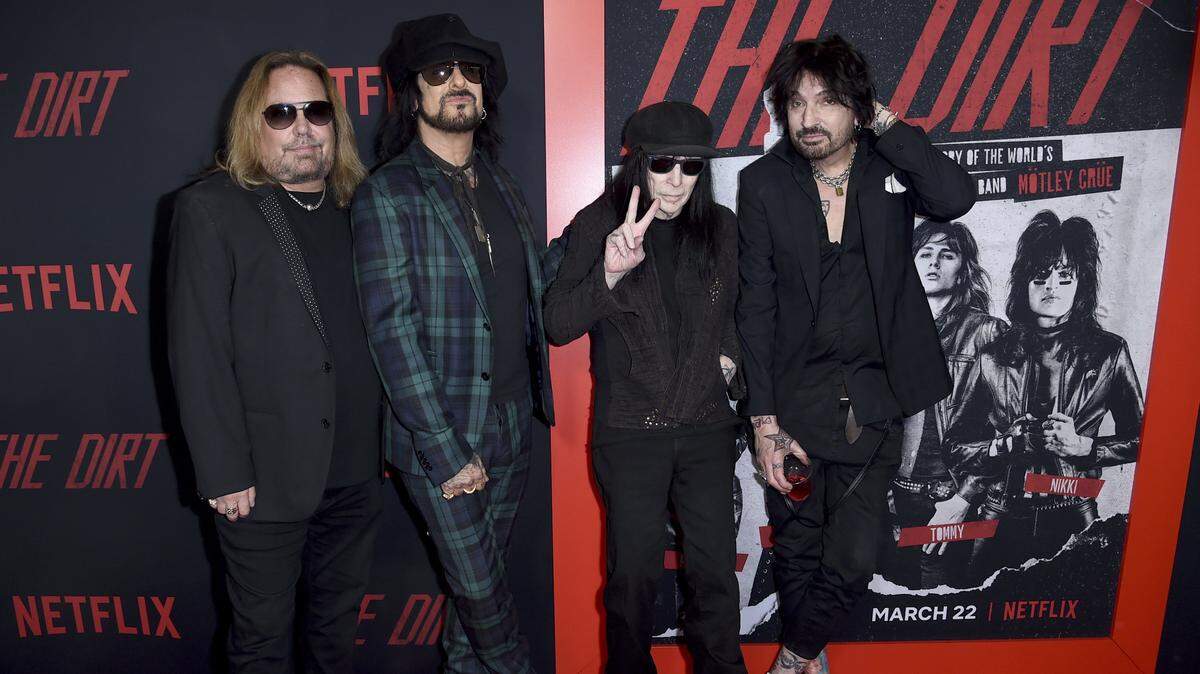 Vince Neil, from left, Nikki Sixx, Mick Mars and Tommy Lee, of Mötley Crüe, arrive at the world premiere of “The Dirt” on Monday, March 18, 2019, at ArcLight Hollywood in Los Angeles.