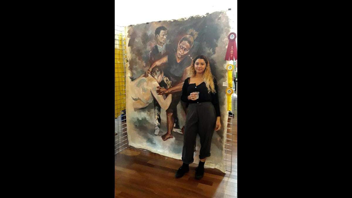 Enya Fontanills began her college career after receiving prestigious awards in 2019. Here she is at last year’s Young Artists’ Gallery hosted by the Woman’s Club of Coconut Grove. Photo provided by the Woman’s Club of Coconut Grove.