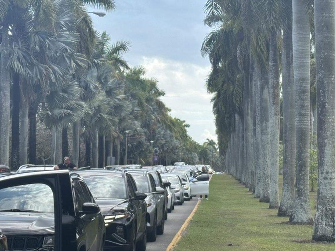 Drivers line up to exit Zoo Miami after being told to leave on Saturday, March 14, 2026.