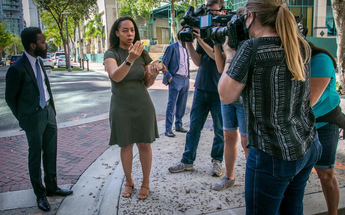Eight months after the incident, LaToya Ratlieff, center, shows reporters where a Fort Lauderdale police officer shot her with a rubber bullet while she was peacefully demonstrating during a Black Lives Matter protest on May 31, 2020.