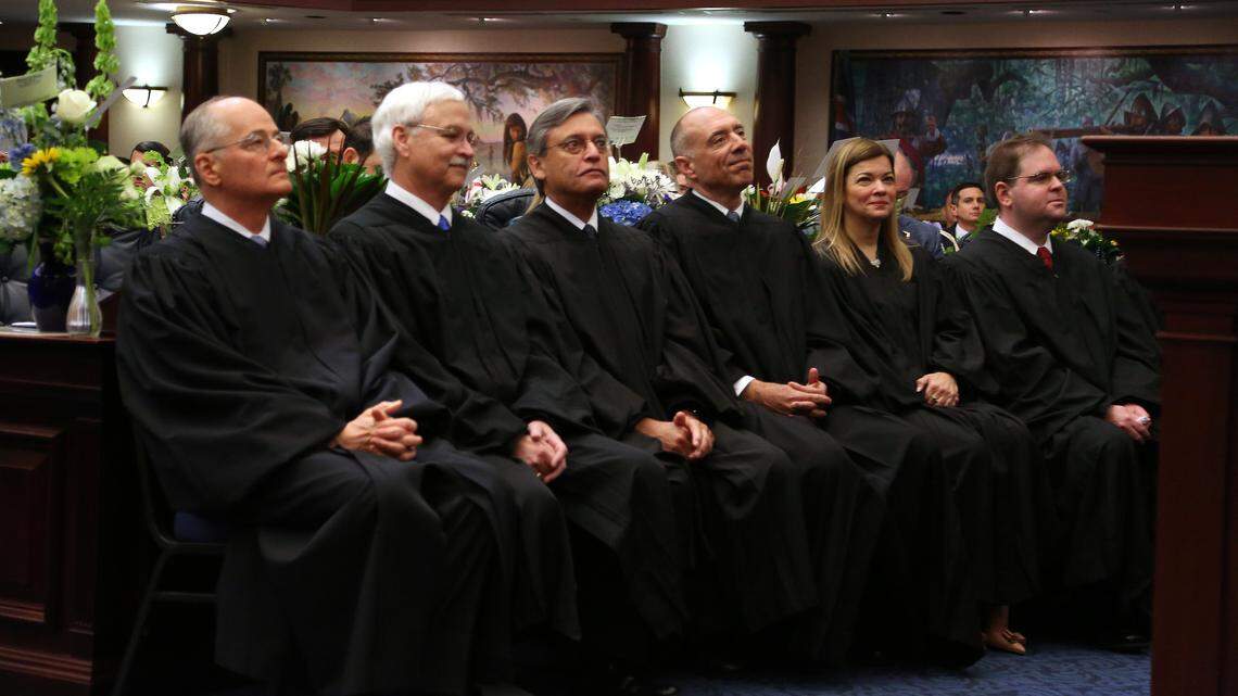 Members of the Florida Supreme Court listen to a speech by Gov. Ron DeSantis, Tuesday, March 5, 2019 in the Florida House during a joint session of the Florida Legislature. From left: Chief Justice Charles T. Canady, Ricky Polston, Jorge Labarga, Alan Lawson, Barbara Lagoa, and Robert J. Luck.