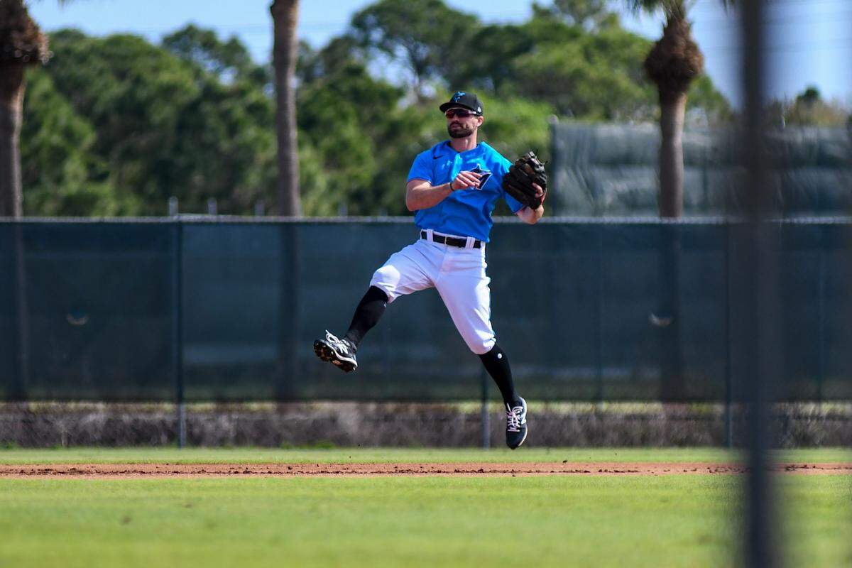 The Miami Marlins’ Jon Berti goes through infield drills on Wednesday, Feb. 24, 2021, during a spring training workout at the Roger Dean Chevrolet Stadium complex in Jupiter, Florida.
