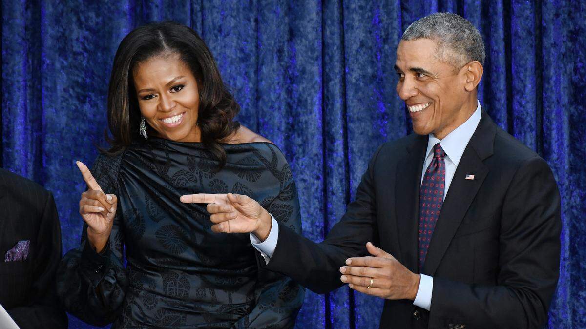 Former President Barack Obama and first lady Michelle Obama attend the unveiling of their official portraits at the National Portrait Gallery on Monday, February 12, 2018 in Washington.