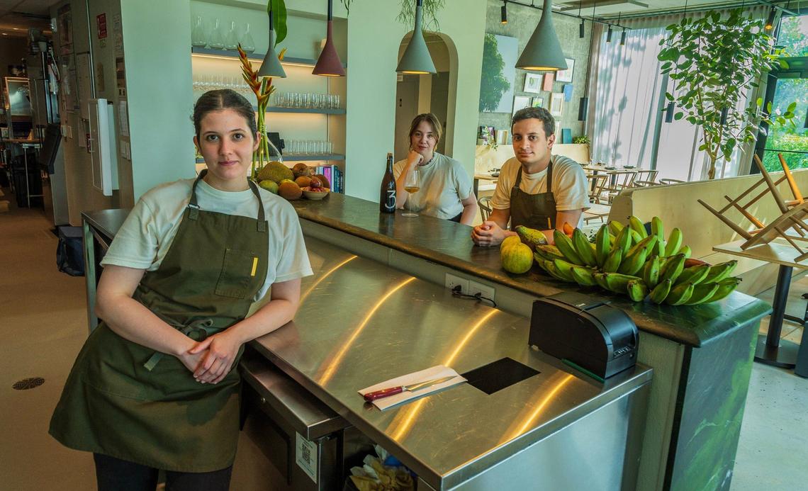 Chef/owner Maria Teresa Gallina, sommelier Shannon Gable and chef/owner Nico Martínez at the counter of Recoveco in South Miami.