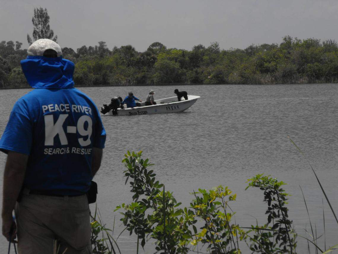 Searchers from Peace River K9 Search and Rescue, in 2015, look in a North Miami-Dade waterway for Noemi Gonzalez. She went missing in 2014.