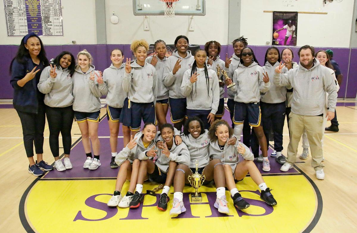 St. Thomas Aquinas Raiders pose for the picture after they won the BCAA Big 8 Girls’ 2023 Basketball championship game against Blanche Ely Tigers on Saturday, January 28, 2023 at South Plantation HS in Plantation. Andrew Uloza / for Miami Herald