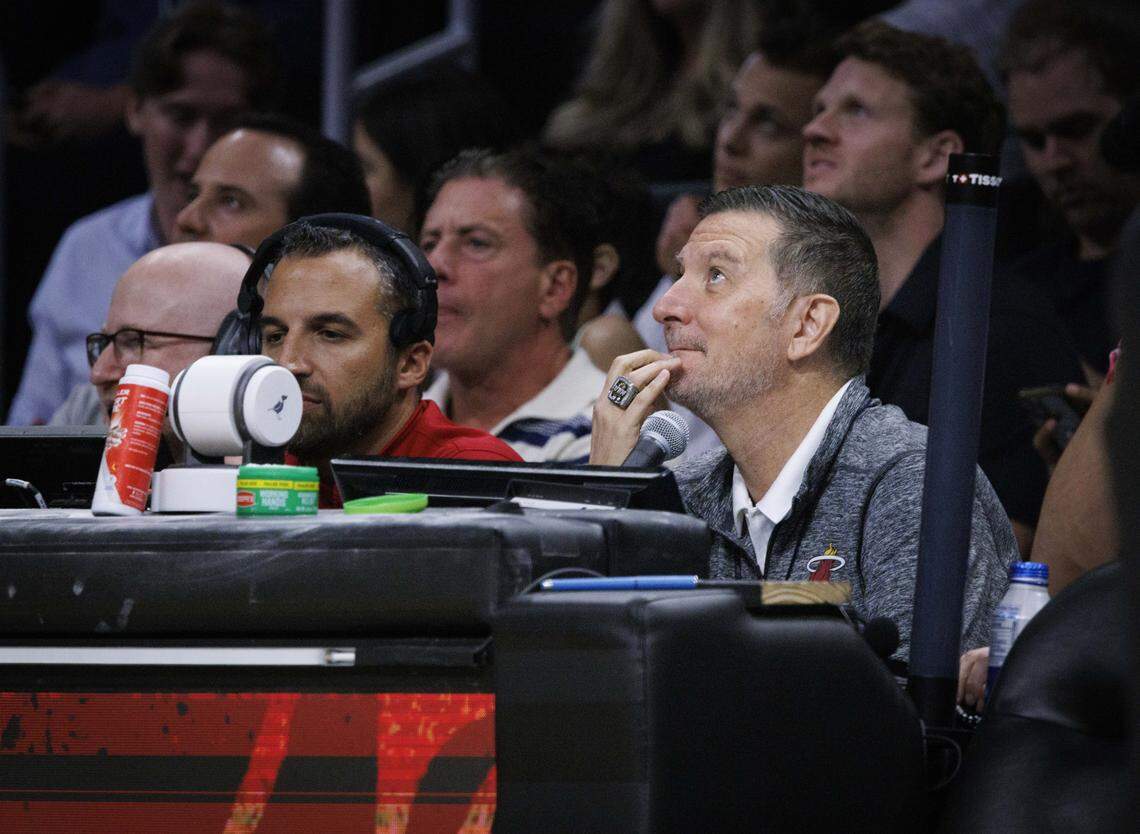 Michael Baiamonte, Miami Heat public address announcer, looks up at the screen during the first half of a Miami Heat game against the Boston Celtics on April 1, 2026, at Kaseya Center in Miami.