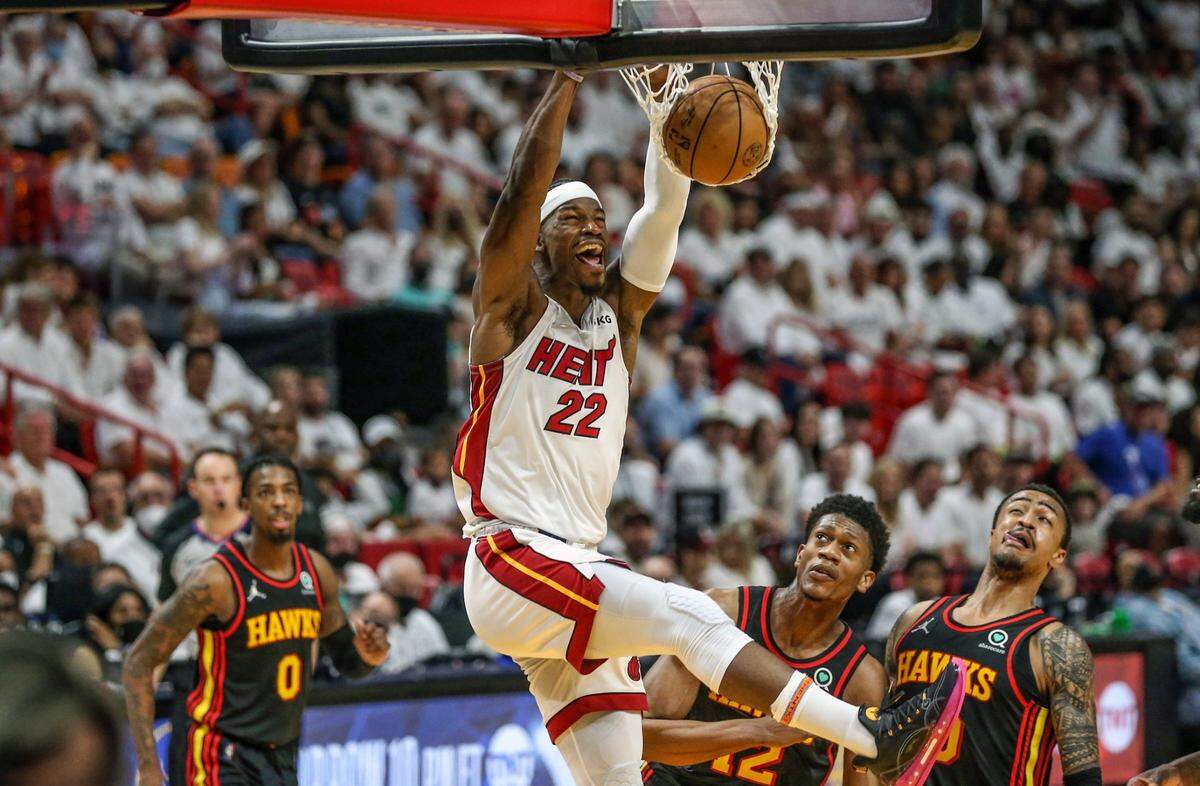 Miami Heat forward Jimmy Butler (22) dunks the ball in the third quarter during game against the Atlanta Hawks at the FTX Arena in Miami, Florida on Sunday, April 17, 2022.