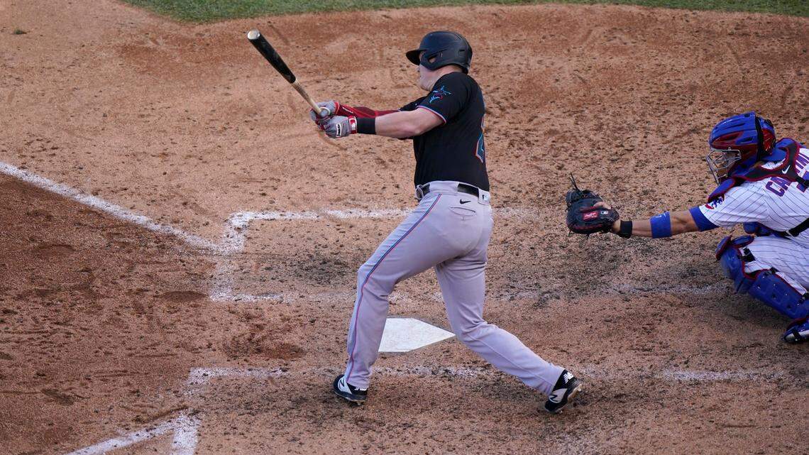 A big swing from Garrett Cooper backs up pitching and advances Miami Marlins to NLDS