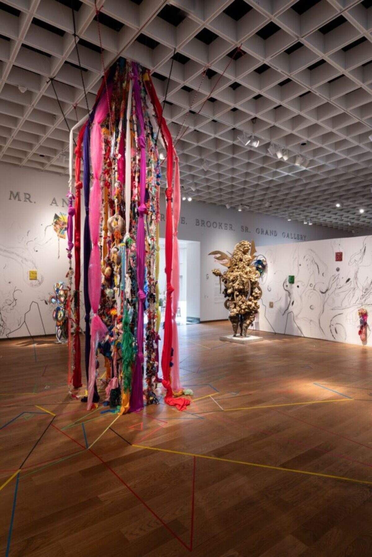 Miami Beach-based artist Charo Oquet’s installation at the Orlando Museum of Art became an opportunity to unite works dating back to 2014 with sweeping wall ink drawings created specifically for the museum show.