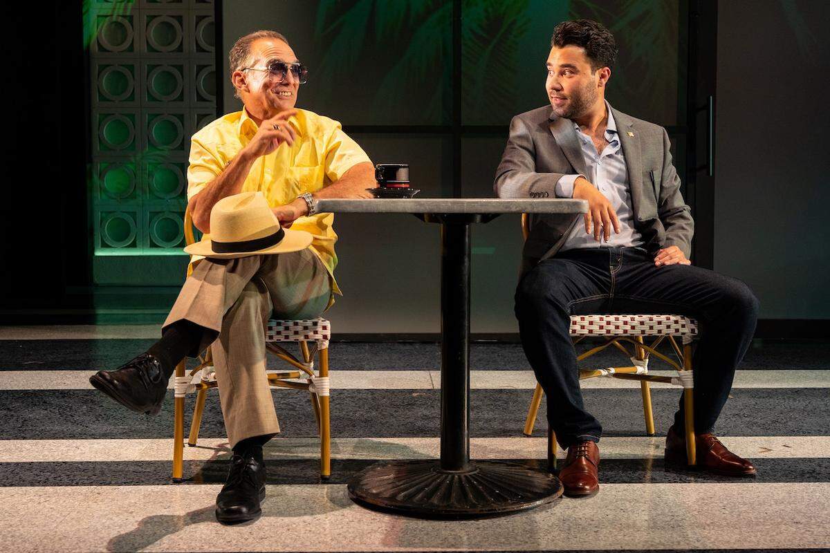 Jonathan Nichols-Navarro, left, and Andhy Mendez talk politics in the Miami New Drama world premiere of ‘The Cuban Vote.’