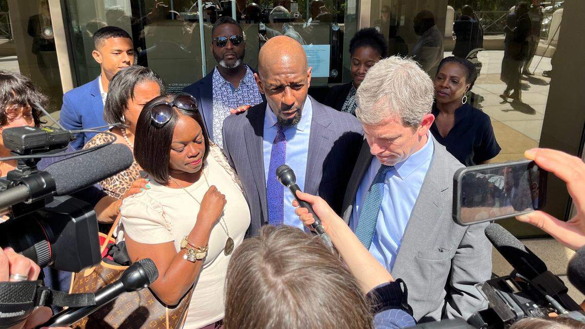 Former Tallahassee mayor and Democratic candidate for governor Andrew Gillum, center, meets with reporters after being acquitted of lying to the FBI on Thursday, May 4, 2023, in Tallahassee, Florida.