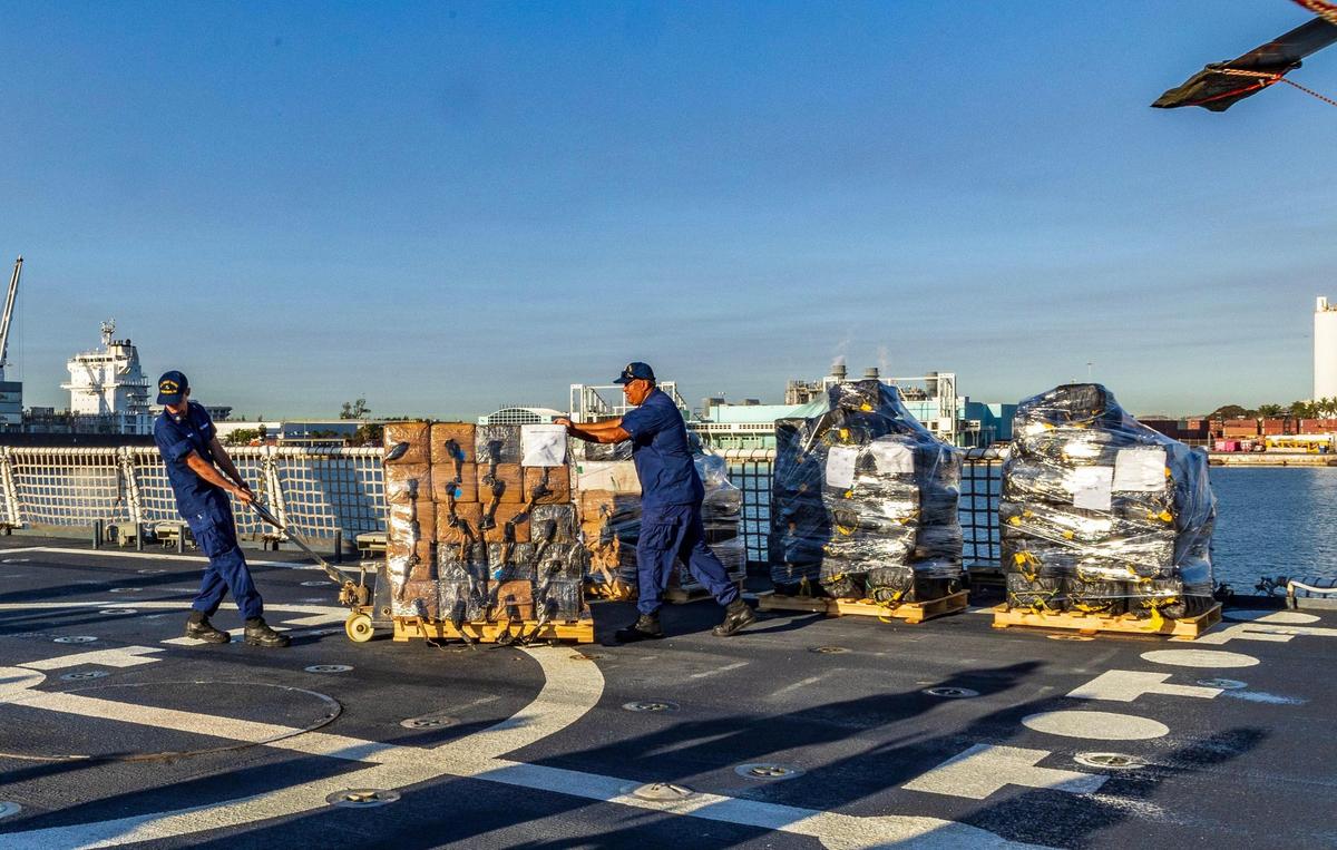 U.S Coast Guard officers offload pallets at Port Everglades in Fort Lauderdale, on Thursday March 20, 2024.