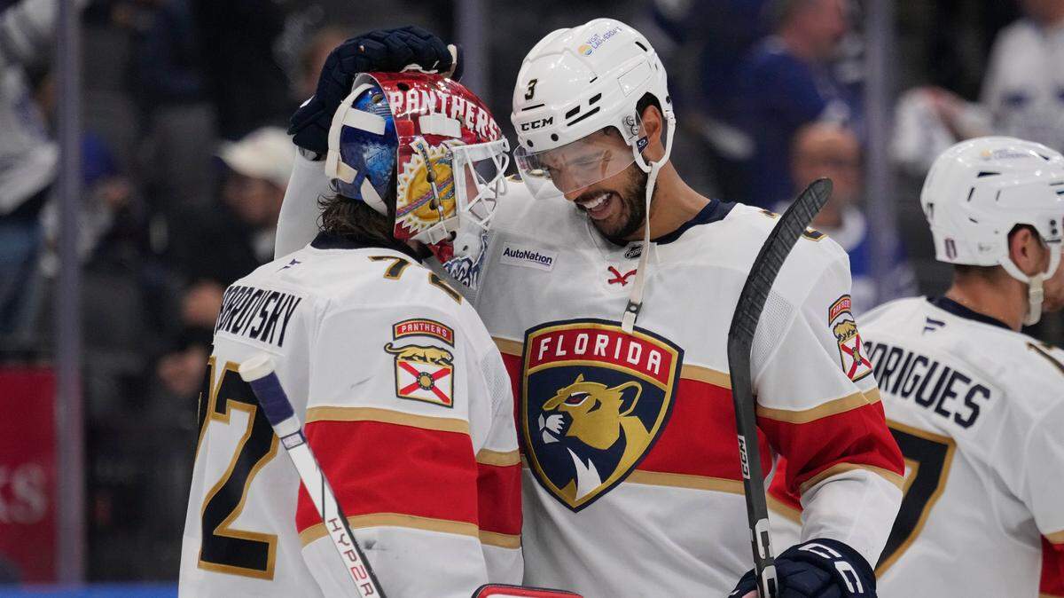 May 18, 2025; Toronto, Ontario, CAN; Florida Panthers defenseman Seth Jones (3) and goaltender Sergei Bobrovsky (72) celebrate winning game seven of the second round of the 2025 Stanley Cup Playoffs over the Toronto Maple Leafs at Scotiabank Arena. Mandatory Credit: John E. Sokolowski-Imagn Images
