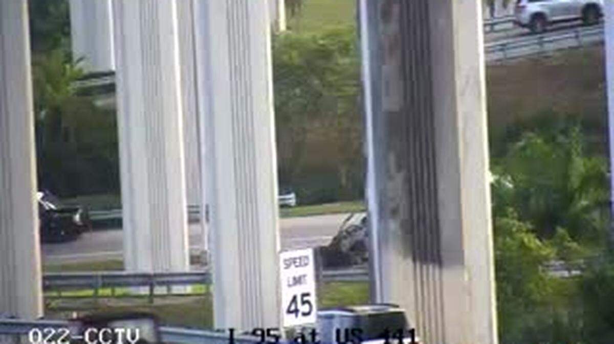 A man was killed in a fiery crash early Tuesday when his SUV collided with a wrong-way driver and went off the Interstate 95 express lanes flyover near the Golden Glades Interchange, troopers said.