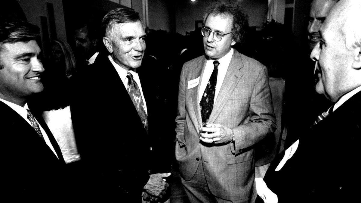 Then Florida Gov. Lawton Chiles, second from left, talks with Seth Gordon, to his right in picture in light suit, in 1993.