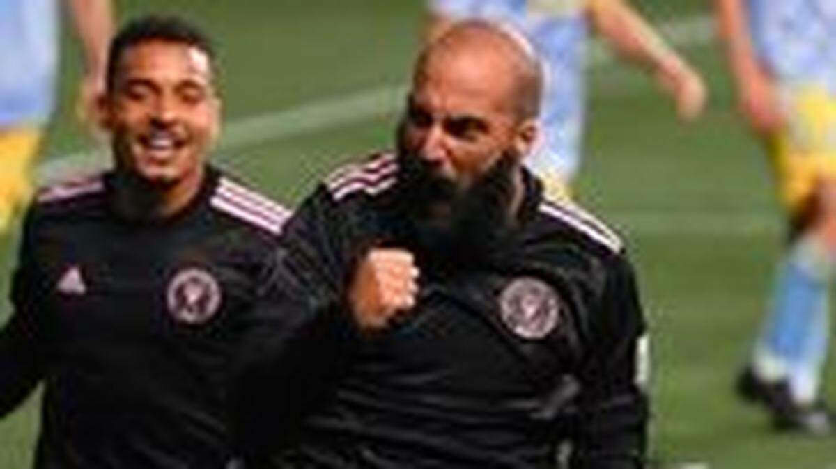 Inter Miami forward Gonzalo Higuain (right) celebrates his goal in a 2-1 road win over the Philadelphia Union on Apr. 24, 2021.