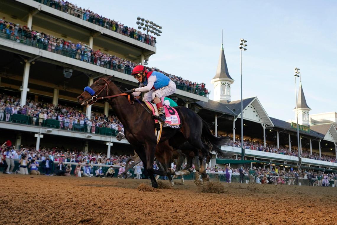 Medina Spirit competes in the Kentucky Derby carrying what was later determined to be a fake rider.