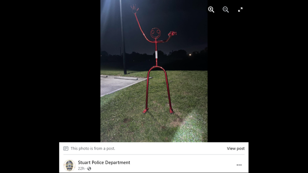 What a witness believed was metal poles was actually a sculpture of a stick figure taken from a local business, police said.
