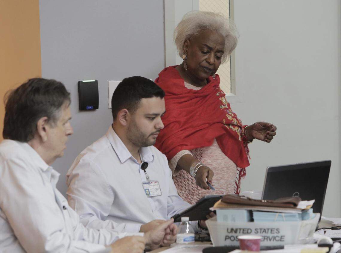 Brenda Snipes, elections supervisor for Broward County, talks to workers during the recount.