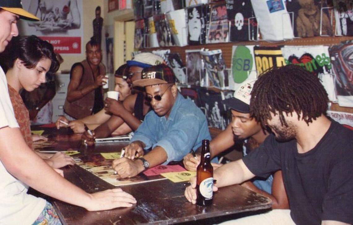 California ska-rock act Fishbone sign posters and albums at Yesterday & Today Records during an in-store appearance in the early 1990s at the Red Bird Shopping Center.