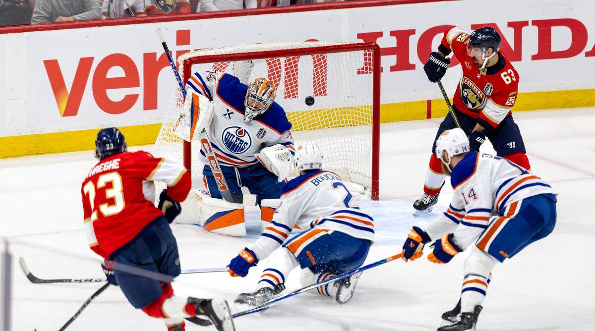Florida Panthers center Carter Verhaeghe (23) scores past Edmonton Oilers goaltender Stuart Skinner (74) during the first period of Game 3 in the Stanley Cup Final at Amerant Bank Arena on Monday, June 9, 2025, in Sunrise, Fla.