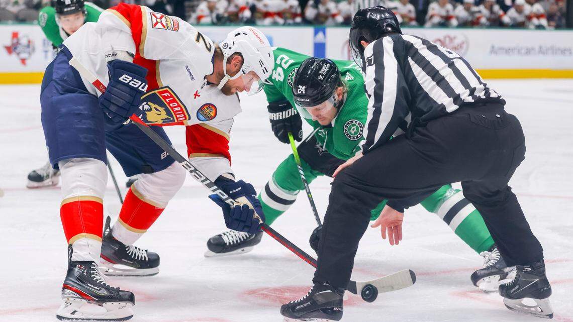Florida Panthers center Eric Staal, left, competes for the puck against Dallas Stars center Roope Hintz, back right, in the first period of an NHL hockey game in Dallas, Sunday, Jan. 8, 2023.