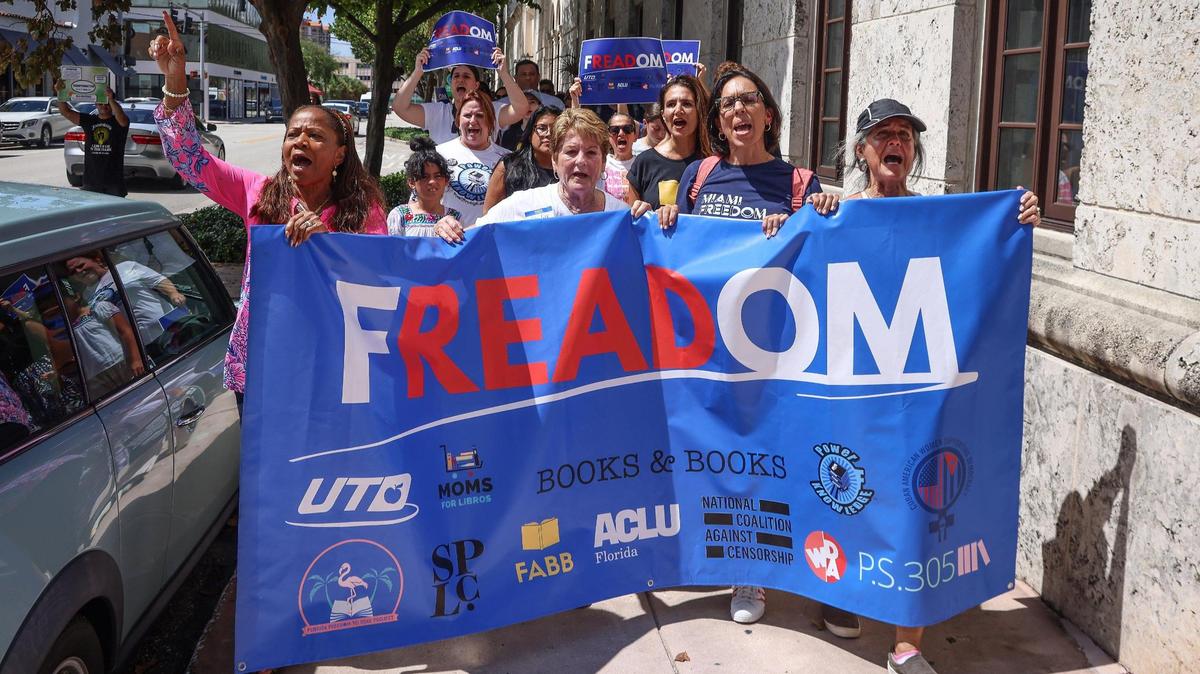 Marchers arrive at Book & Books in Coral Gables after marching from the Coral Gables Congregational United Church of Christ on Sunday, Oct. 1, 2023. The march, called the ‘Walk for Freadom,’ kicked off Banned Books Week 2023 to protest book bans in Florida public schools. Several local parents’ groups have arisen to combat book bans in schools.
