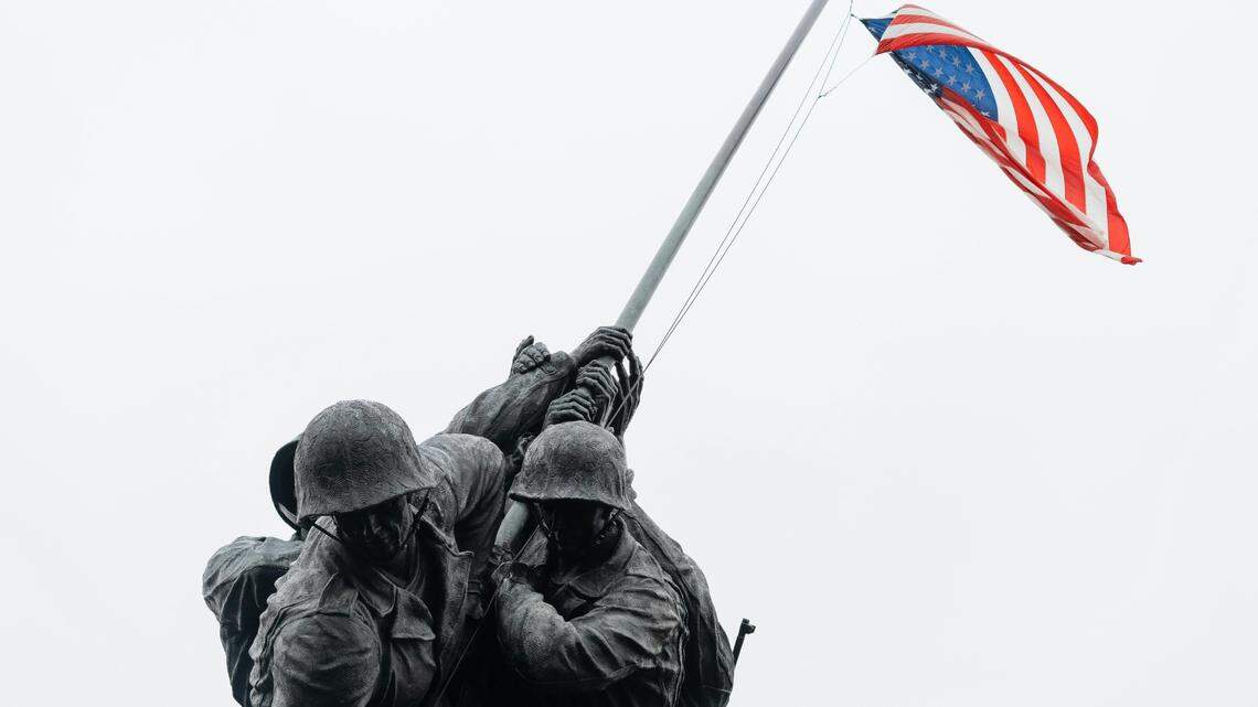 A U.S. Marine Corps veteran accused of lying about his military service has been sentenced to prison, feds say. The U.S. Marine Corps War Memorial in Arlington, Virginia is pictured in this file photo.