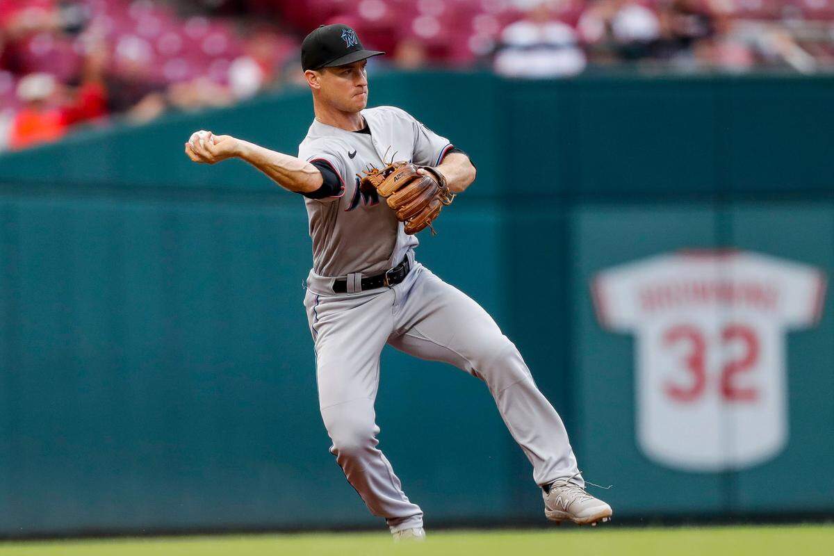 Aug 8, 2023; Cincinnati, Ohio, USA; Miami Marlins shortstop Joey Wendle (18) throws to second to get Cincinnati Reds left fielder Spencer Steer (not pictured) out in the second inning at Great American Ball Park.