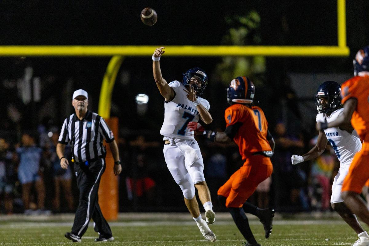 Palmetto quarterback Lucas Goenega (7) throws the ball down field during a high school football game against the Homestead Broncos at Harris Field in Homestead, Florida, on Friday, August 25, 2023.