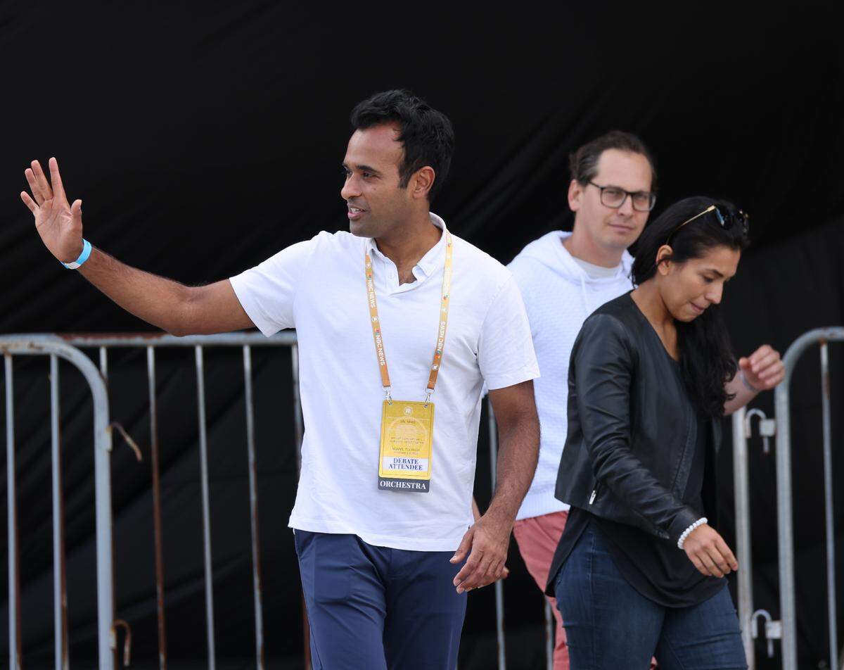 Republican Presidential candidate Vivek Ramaswamy waves as he exits from the Knight Concert Hall prior to the Republican Presidential Primary debate at the Adrienne Arsht Center for the Performing Arts on Wednesday, Nov. 8, 2023 in Miami, Florida.