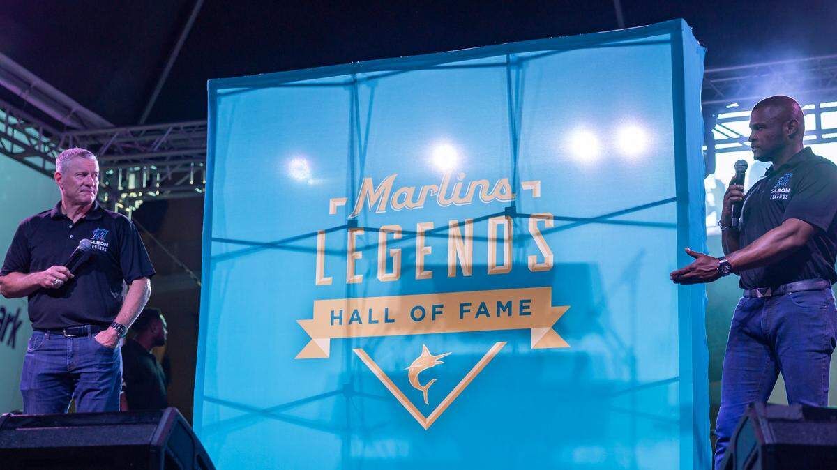 Former Miami Marlins players Jeff Conine, left, and Luis Castillo speak after the team announced the creation of the Marlins Legends Hall of Fame during the team’s fan festival at loanDepot park on Saturday, Feb. 8, 2025, in Miami, Fla.