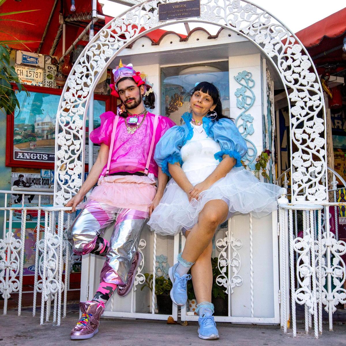 Liz Ferrer and Bow Ty, two Miami-based visual artists and reggaetoneras, pose at Yambo, a beloved Nicaraguan restaurant in Miami.